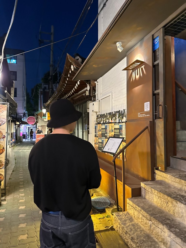 Romantic night out in Ikseon-dong with traditional hanok buildings and ambient lighting