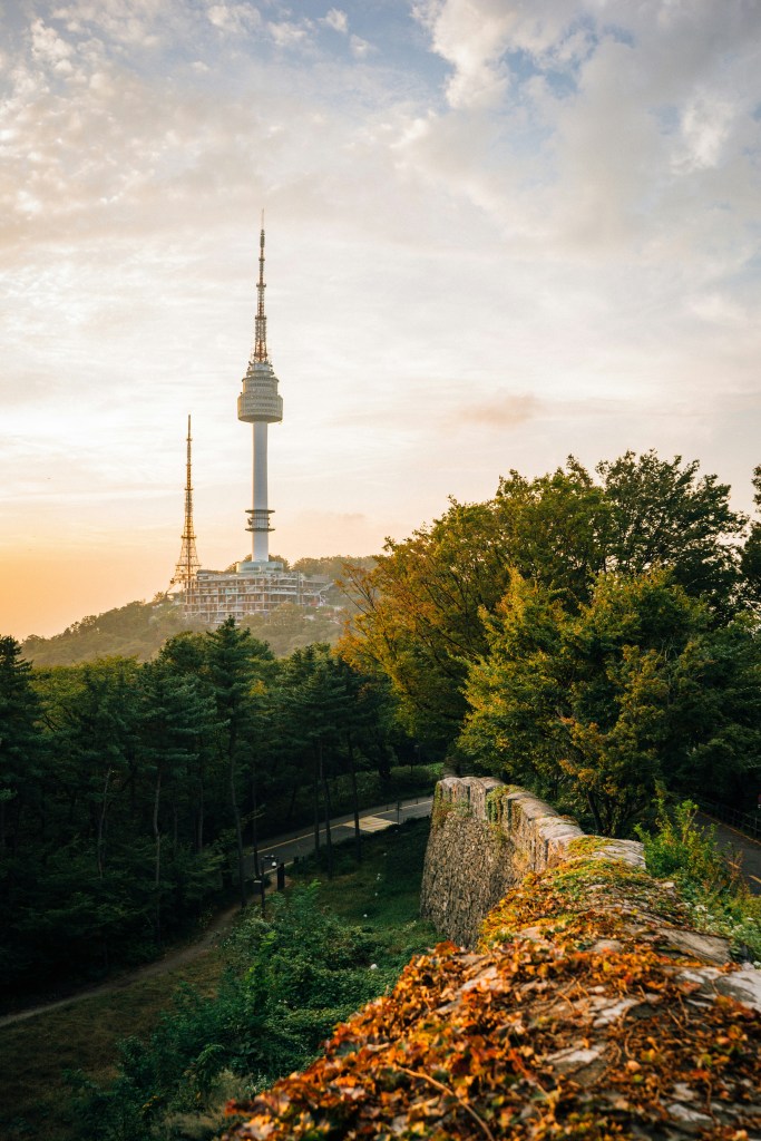 Sunset view of Namsan Tower and fortress wall trail from Naksan Park in Seoul